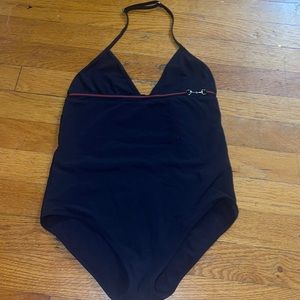 Gucci swim suit.